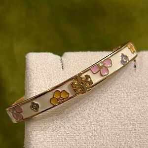 Tory Burch Kira enamel hinge bracelet with a floral pattern